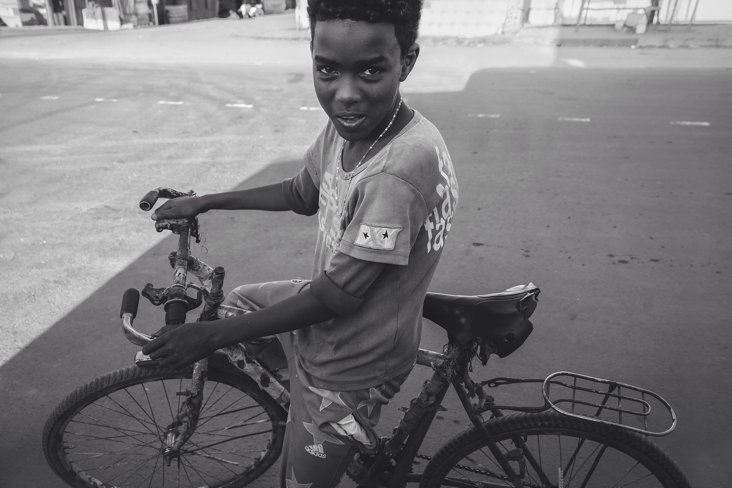 Kenyan boy and his bicycle